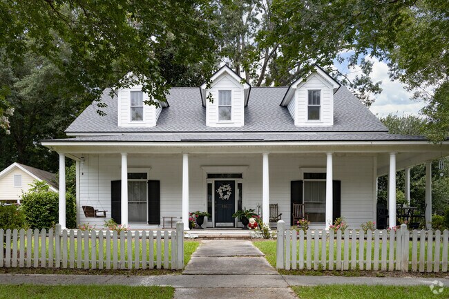 Some homes in Georgetown feature deep front porches and white picket fencing.
