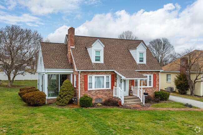 A picturesque Cape Cod home with dormer windows in West York.