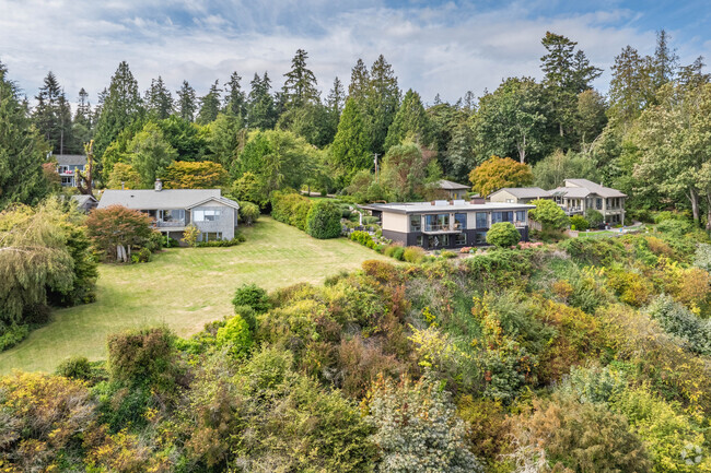Some homes in Yeomalt Point are nestled amongst the trees with truly breathtaking views.