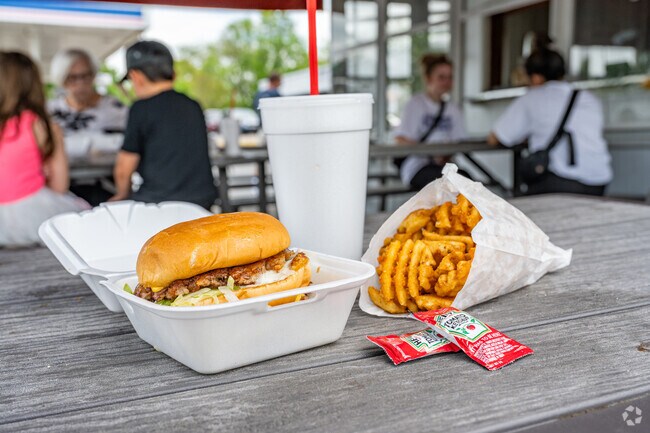A Jug Boy burger, waffle fries, and a shake are staples at El Dorado-Williamsdale's The Jug.