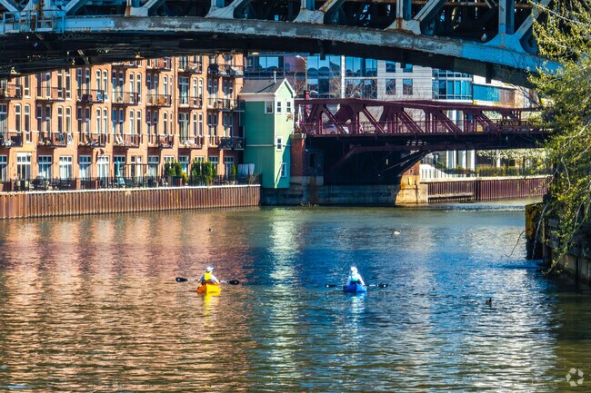 River North residents kayak along the Chicago River's branches for a great day outdoors.