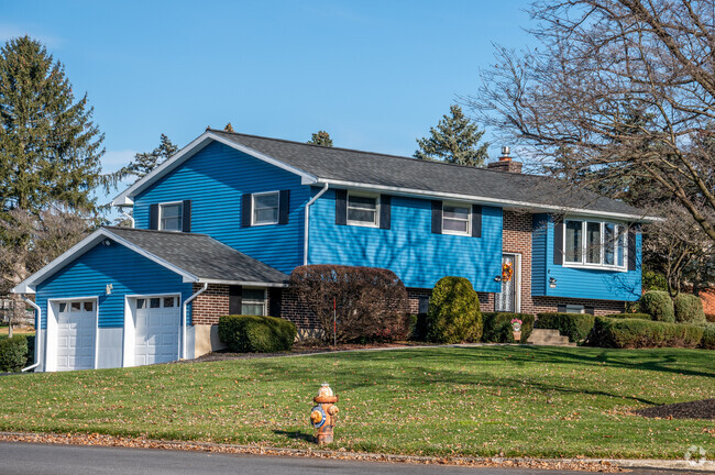 Lovely blue 2 Story homes sit on large corner lots in Upper Nazareth.
