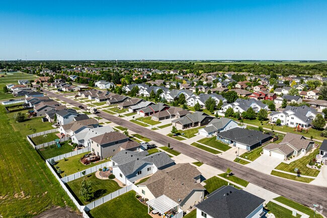 Bennett's vibrant streets and scenic landscapes captured in breathtaking aerial shots.