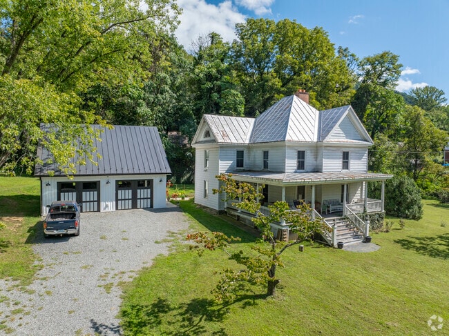 A Queen Anne home with a large, new garage on Covesville Ln.