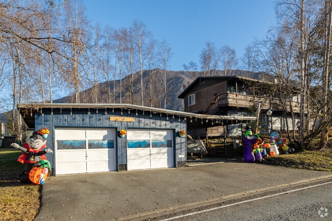 Split level homes ride the hillsides in rugged Chugiak.
