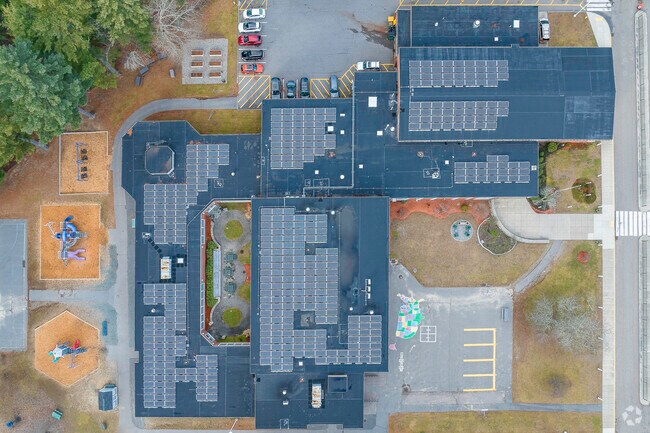 An aerial top-down view of the large Martha Jones School campus in South Westwood, MA.