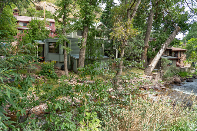 These Eldorado Springs homes are nestled into the lush green mountain side.