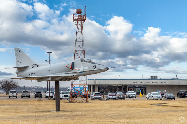 Thief River Falls Regional Airport features a Navy training jet on display.