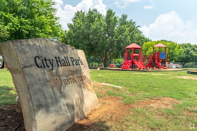 City Hall Park in Justin offers play areas and community gathering spaces.