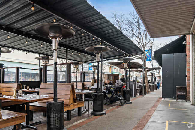 Enjoying the neighborhood's culinary delights on Laurel street near Cordes.