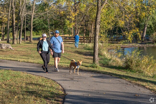 Pets are welcome at Echo Hollow Nature Park a short drive from West Newton.