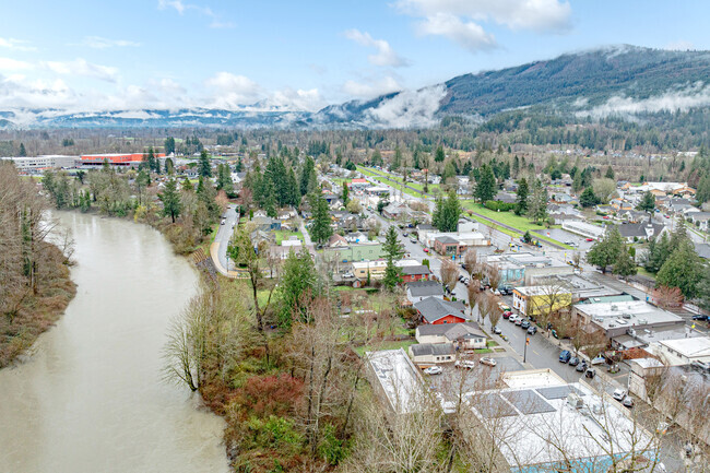 The Cascade Mountains are visible from most homes, and the Snoqualmie River is in the community’s south.