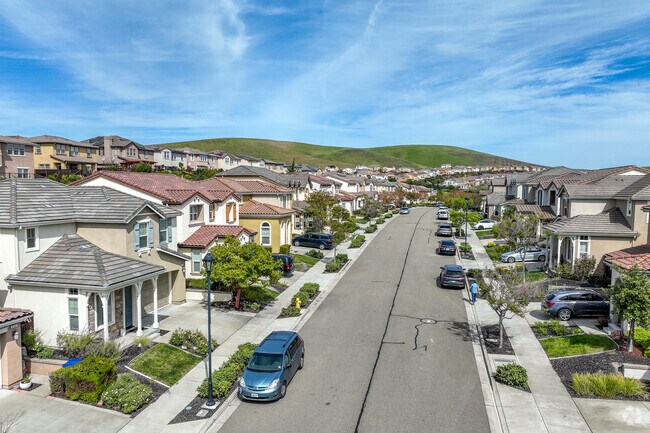 Positano’s streets are lined with new traditional homes with stone facades and Spanish Colonial Revival details.
