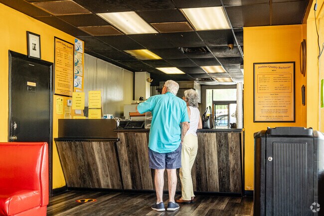Carver and Edgewood Manor residents study the menu to choose their lunch.
