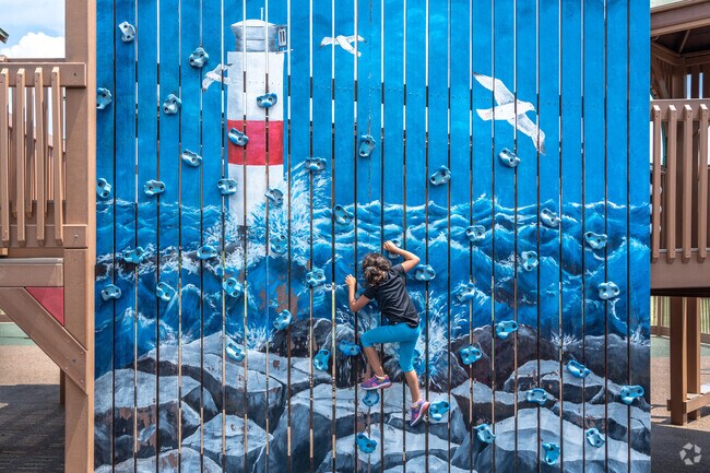 Kids will love the rock climbing wall at Kenosha Dream Playground.