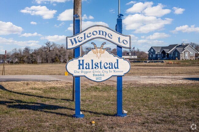 The city of Halstead greats you with a wooden sign.