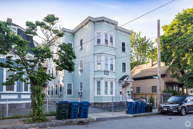A row of homes are found in a variety of triple deckers and single family styles.