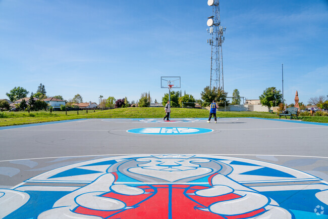 Play basketball on the vibrant Sacramento Kings themed court at Levar Burton Park.