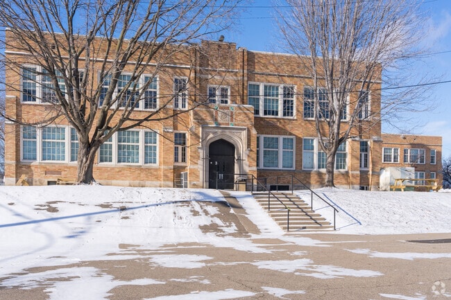 Curriculum emphasizes high standards, critical thinking, research, and diverse perspectives.