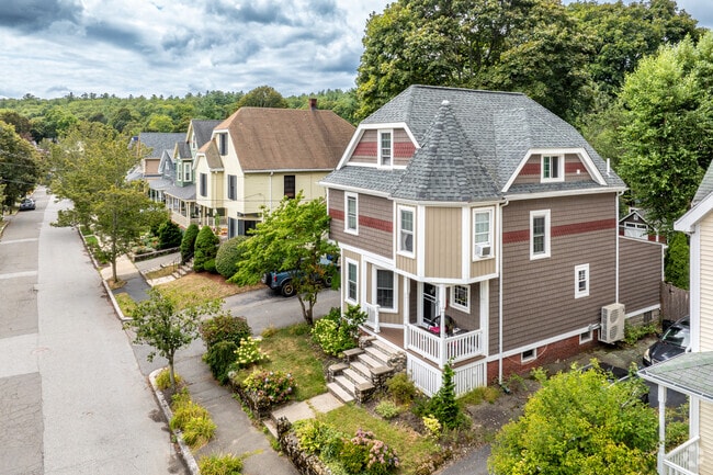 A row of Victorian and New Englander style homes line the streets of the Wyoming neighborhood of Melrose, MA.