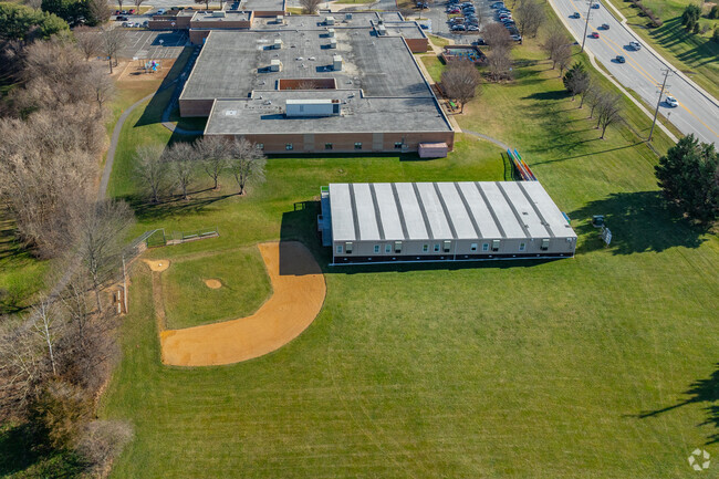 There is a baseball field behind the Fulton Elementary School grounds.