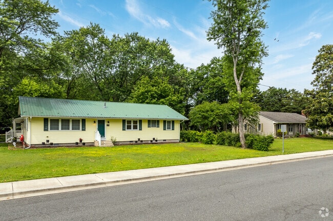 These two ranch homes sit on large, wooded lots along Margaret Street in Georgetown.