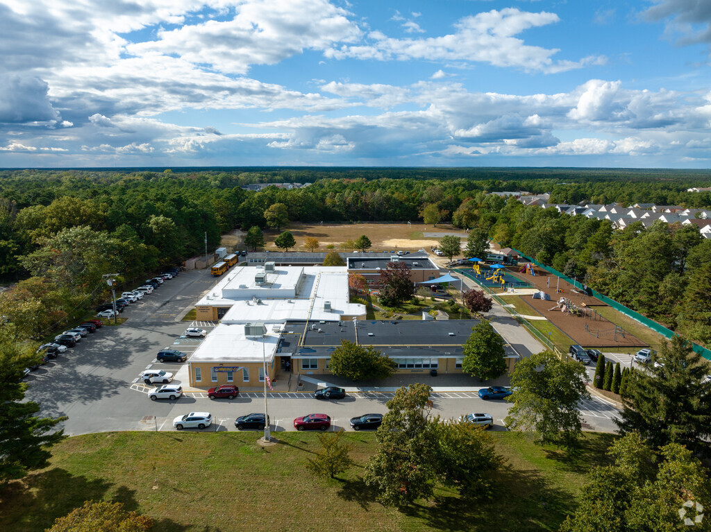 Whiting Elementary School in Manchester Township is surrounded by trees and greenery.
