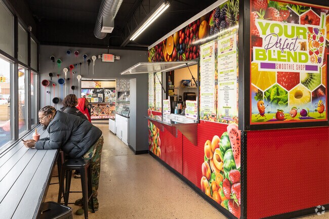 Watcha Wanna Eat Food Hall offers a variety of different food vendors in Schulze.