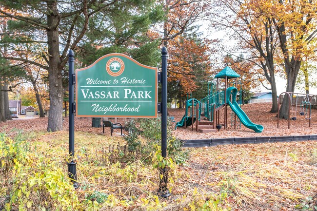 You can find a Vassar Park 
welcome sign next to the playground at Vassar Hill Park.