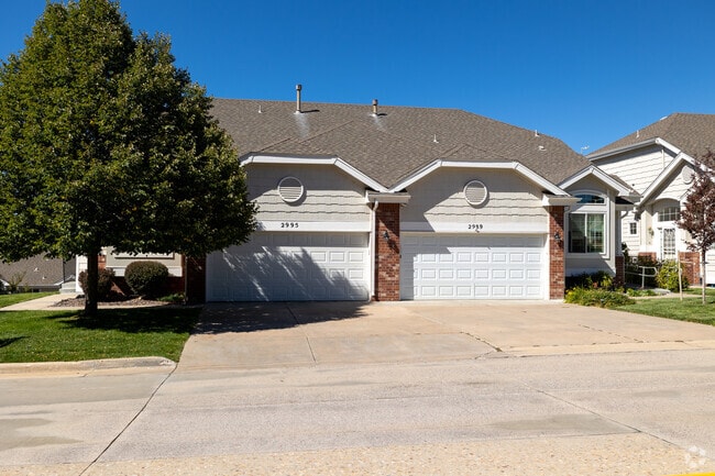Duplex homes back up onto the Plum Creek Golf Course.