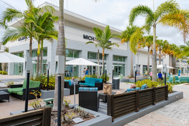 Grab a snack and take a seat after some retail therapy at Tanger Outlet near Tuscany Woods.