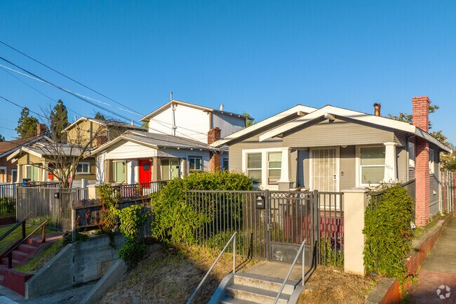 A row of bungalow homes are built along a rolling hillsides in Tucxedo, Oakland.