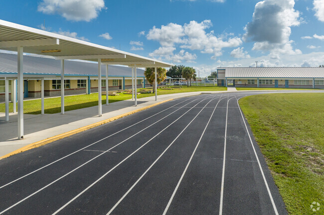 The running track at Mariner Middle School doubles as a pick up lane.