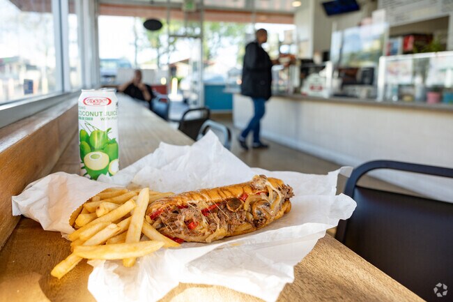 Cox locals enjoy a philly cheese steak sandwich at Ben's Burgers.