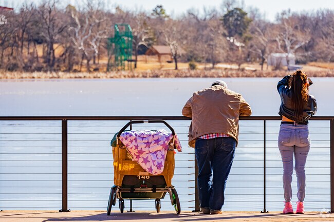 Family enjoy bird watching at the Northeast Lake near Lake Aluma.