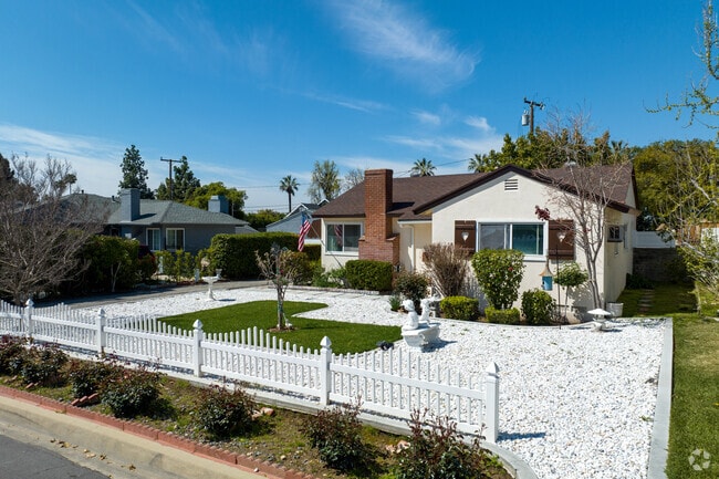 Cozy cottages with small front yards and white picket fences are commonplace in Monrovia.