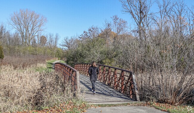 Take a leisurely stroll along the paths at Maitland Park's namesake park.