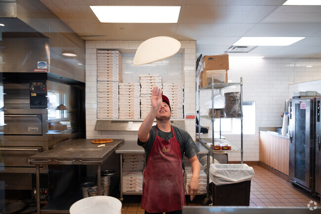 Take your kids to Dion's where they'll have a front row view of the flying dough.