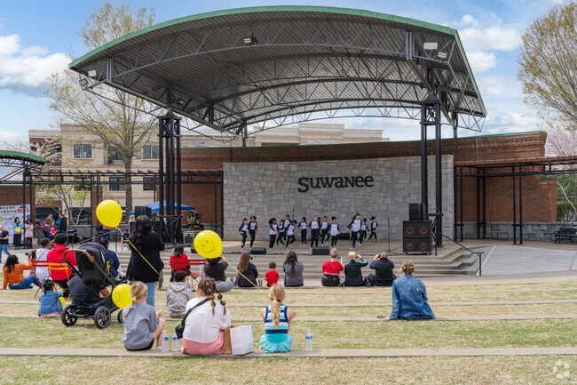Suwanee Town Center's amphitheater-style stage hosts various events, like Taste of Suwanee.