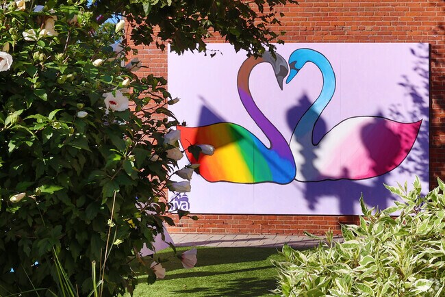 Murals on the YMCA building brighten Main Street in Downtown Melrose.