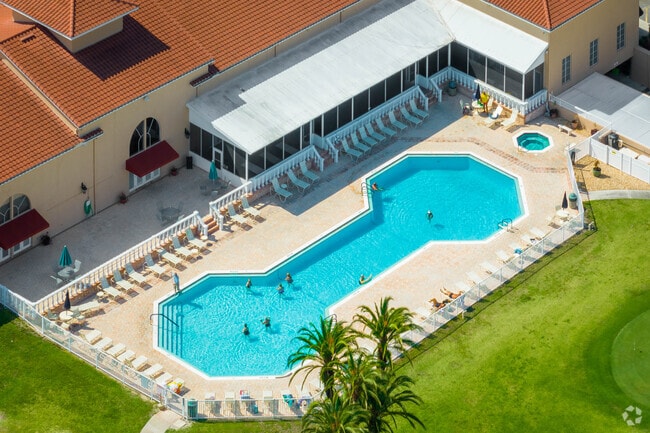 Cool off in the Olympic size pool located at the Four Lakes Golf Club clubhouse.