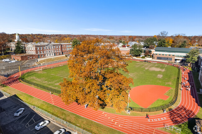 Students often do laps around the track during PE at Mamaroneck High School.