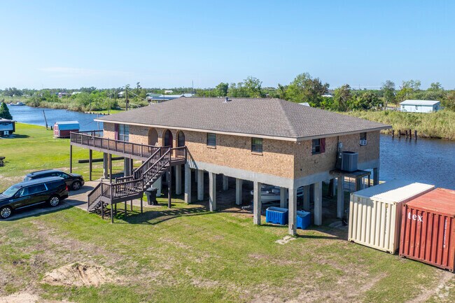 Stilt Homes are the most common house style in Dulac, like this brick home on Onezia St.