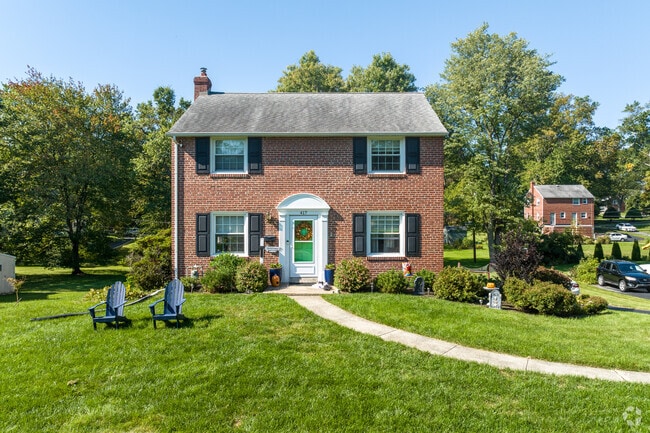 A red brick colonial is typical of homes in Nether Providence Township, Pennsylvania.