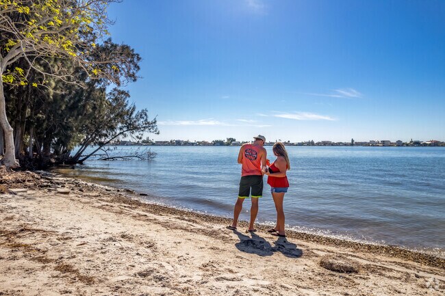 Bicentennial Park offers waterfront views with a small beach.