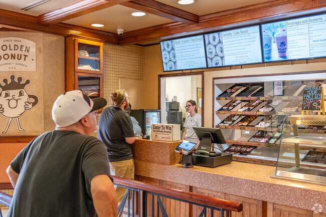 The Waverly Terrace Golden Donut typically has a long line of residents awaiting their donuts.