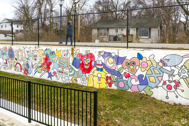 A pop of art is displayed on a wall around the school at McGrath Elementary.