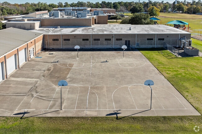 Benfer Elementary School's basketball court invites friendly games and skillful play.