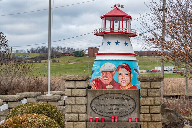 A touching memorial for Thomas E. Tarr Jr. is visited by Meadow Lands locals.