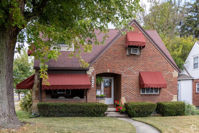 This beautiful Tudor style home is nestled in Hillcrest.